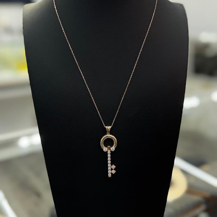 14K NECKLACE WITH A DIAMOND KEY PENDANT